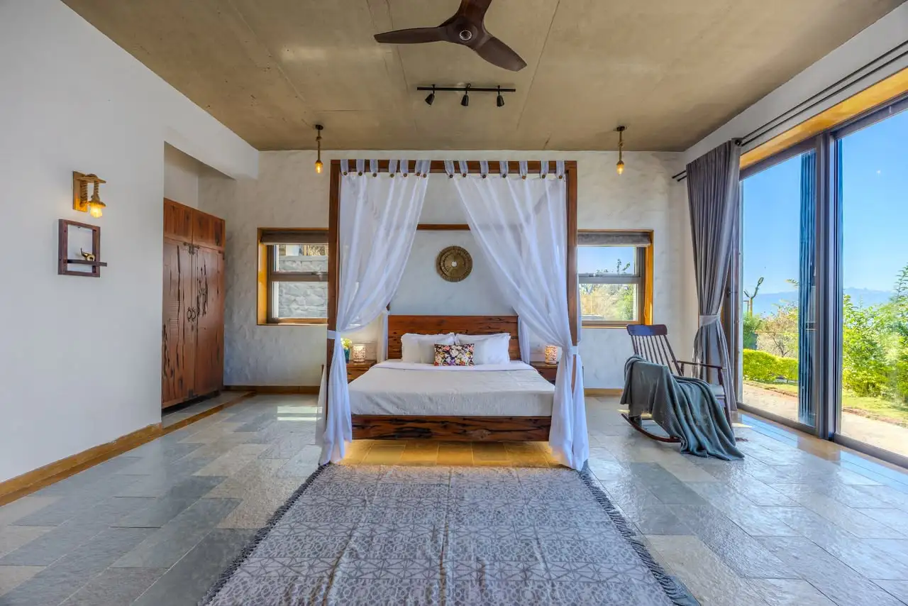 Bedroom with a canopy bed, Saah Villa