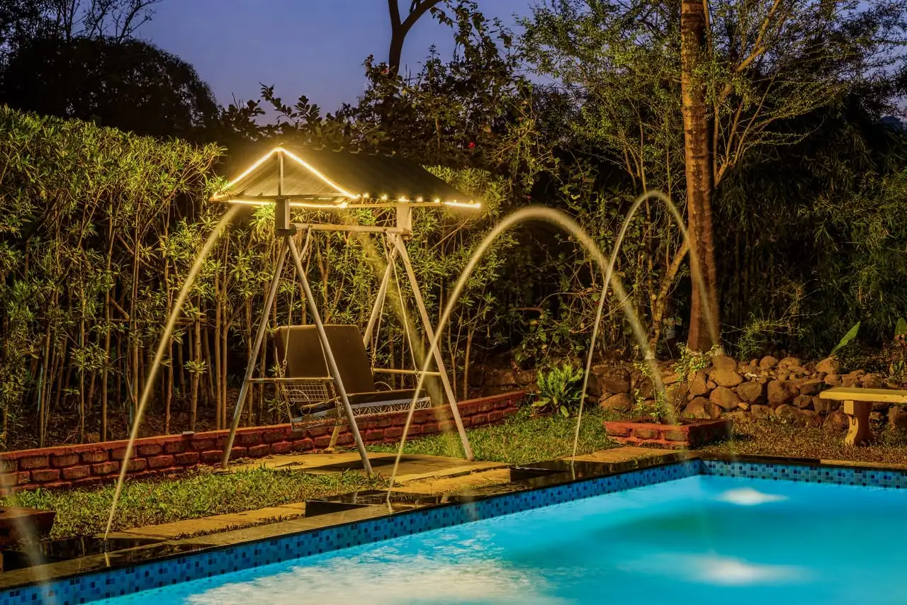 Pool and fountains at night, Borde Farms Panshet