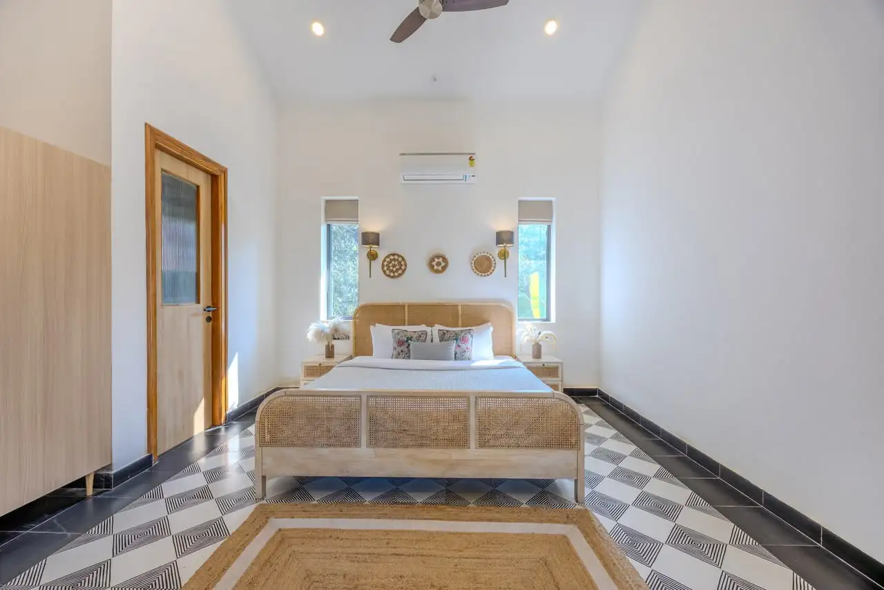 Bedroom with a patterned floor, IDA Villa 12